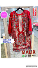 “Radiant Red Salwar Kameez: Bold Elegance”