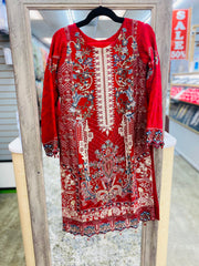 “Radiant Red Salwar Kameez: Bold Elegance”