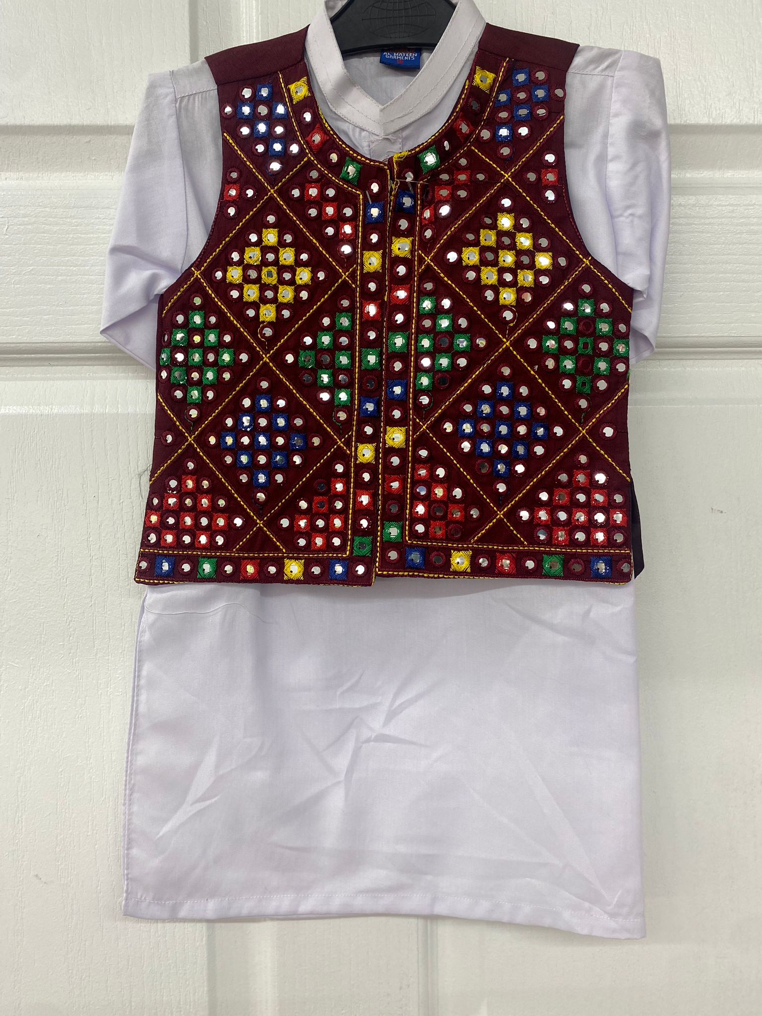 White color salwaar kameez for boys with waist coat.