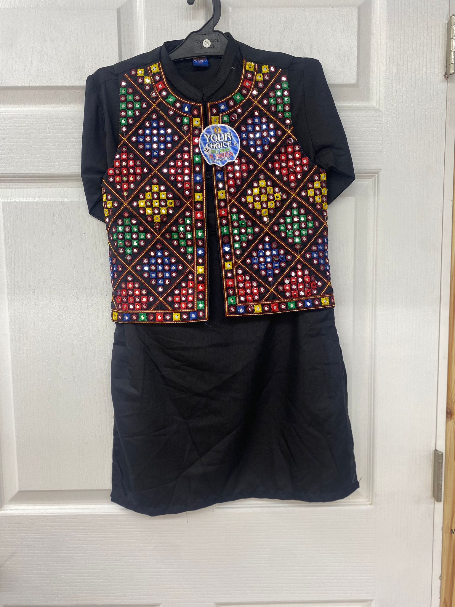 Black color salwaar kameez with mirror work waist coat.