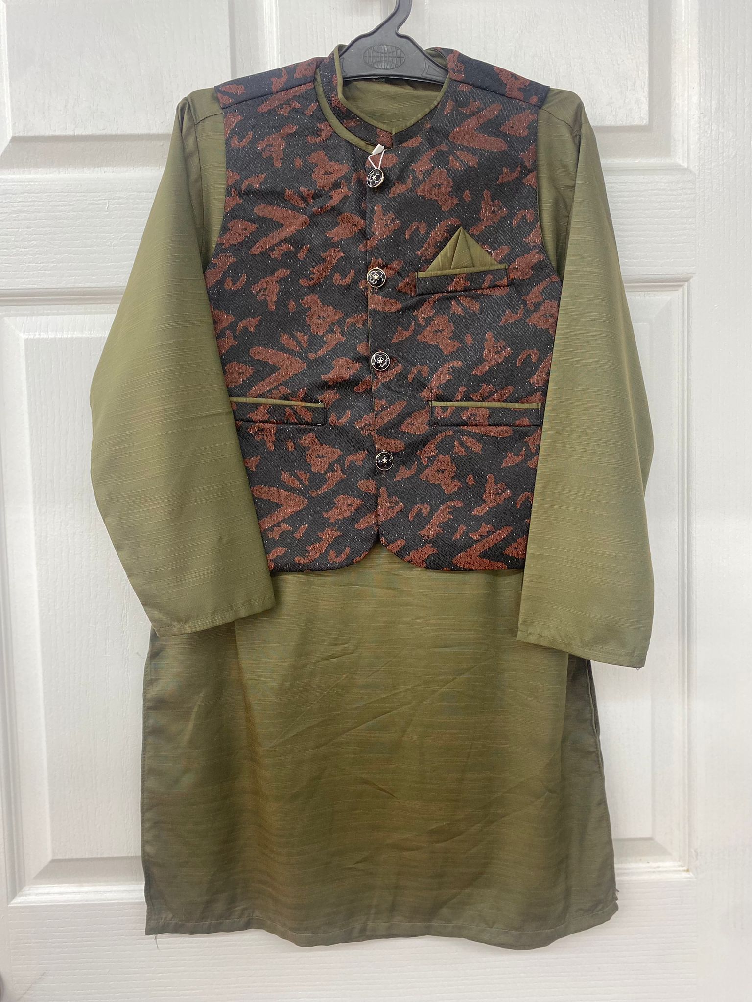 Olive green salwaar kameez with waist coat.