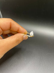 18KT gold drop shaped ring with diamonds