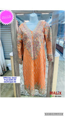 “Radiant Light Orange Salwar Kameez Ensemble”