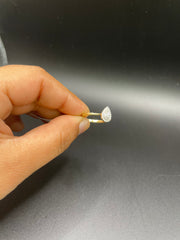 18KT gold drop shaped ring with diamonds