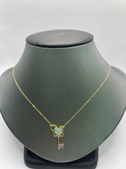 10KT gold butterfly and key necklace