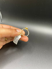 18KT gold drop shaped ring with diamonds