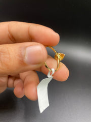 18KT gold drop shaped ring with diamonds