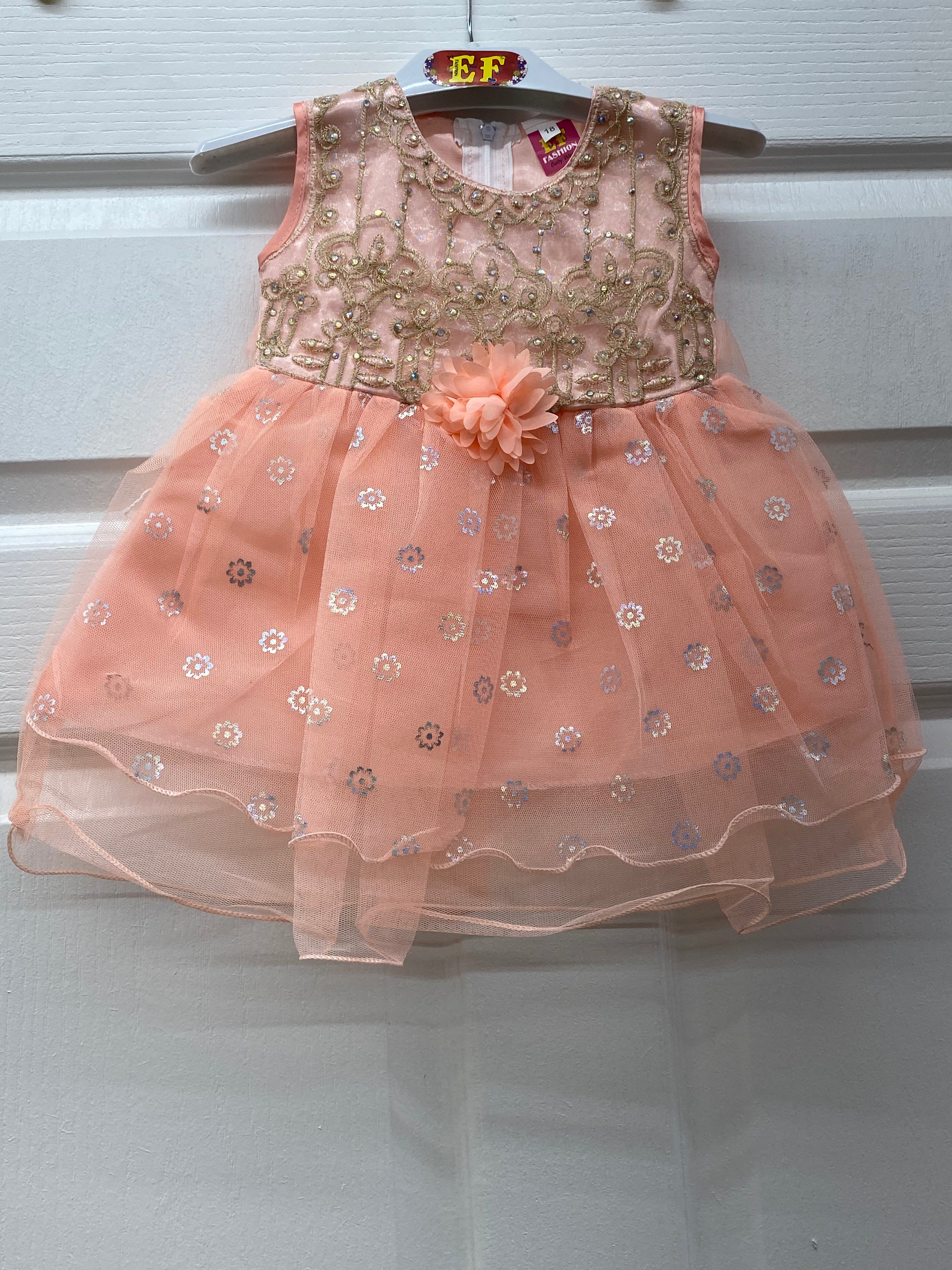 Peach color designer frock for girls